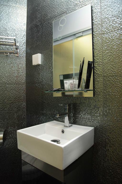 Hotel Conext Цзюлун Номер фото