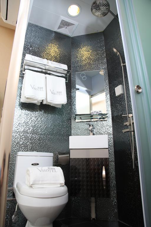 Hotel Conext Цзюлун Номер фото