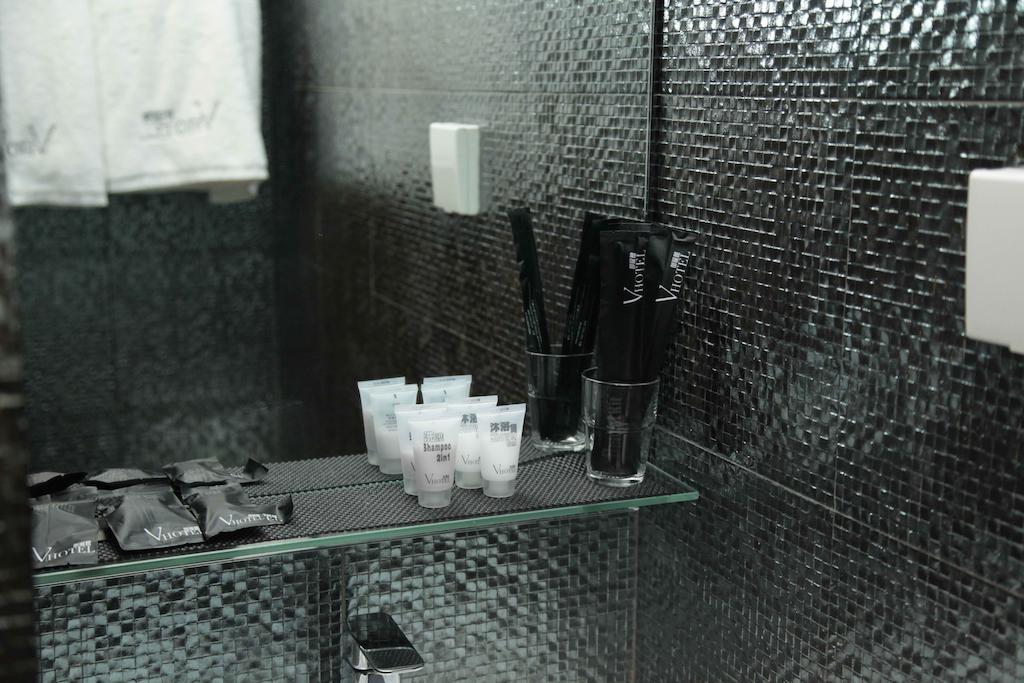 Hotel Conext Цзюлун Номер фото
