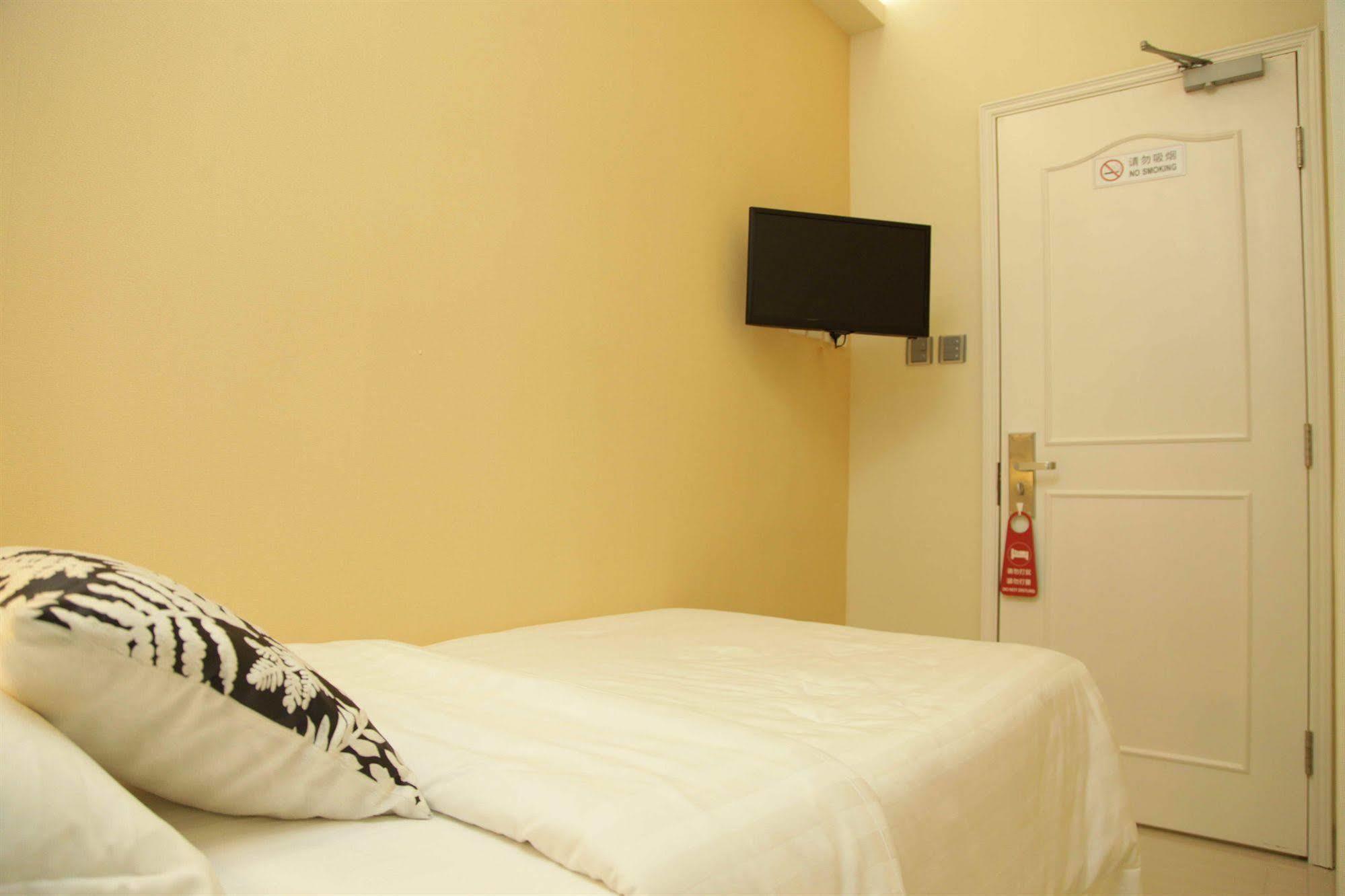 Hotel Conext Цзюлун Экстерьер фото