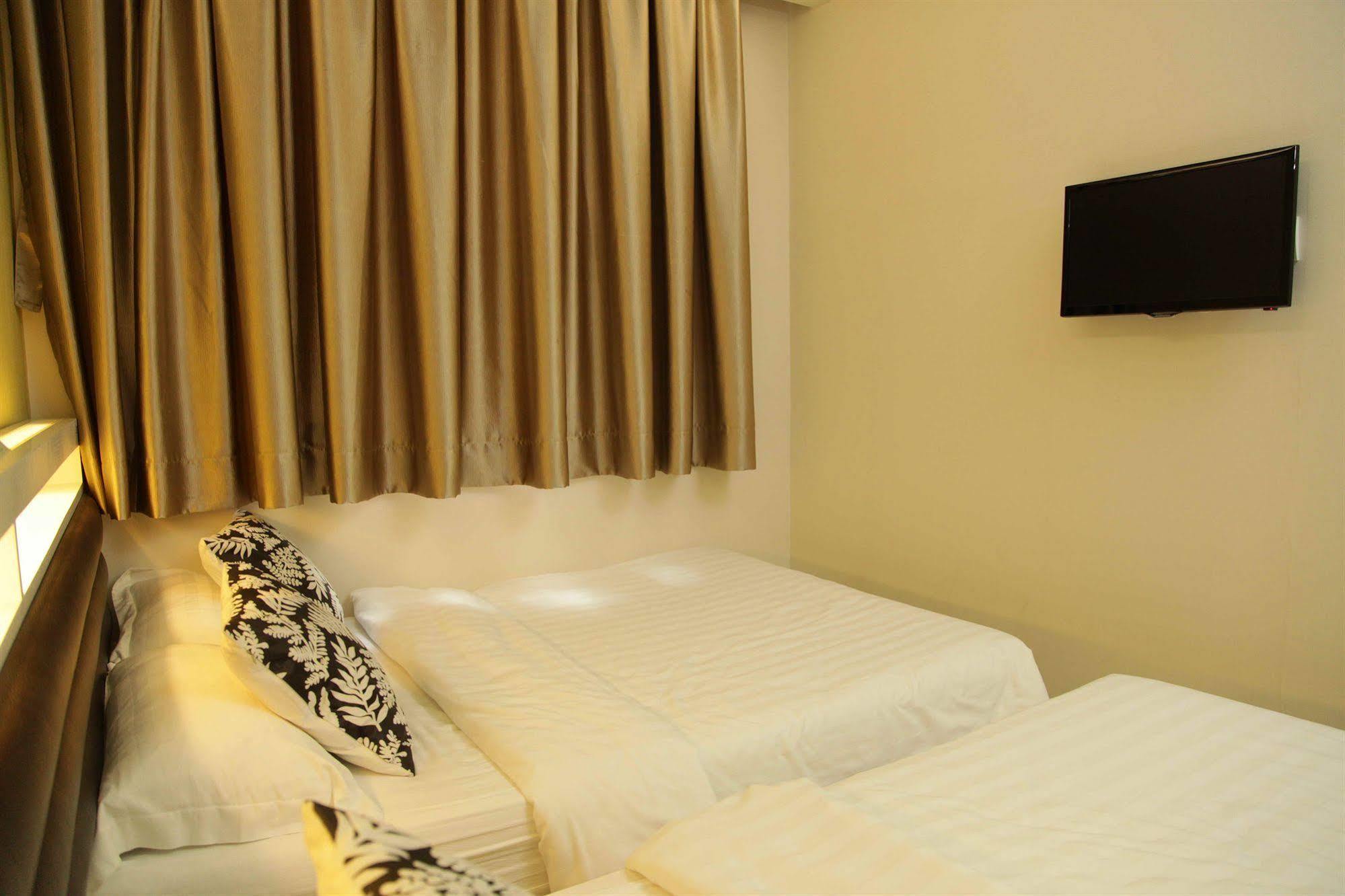Hotel Conext Цзюлун Экстерьер фото