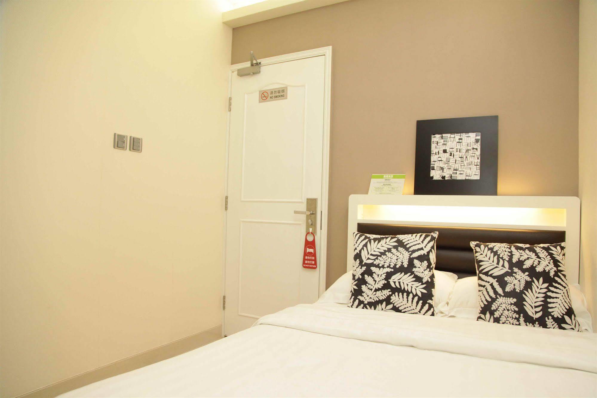 Hotel Conext Цзюлун Экстерьер фото